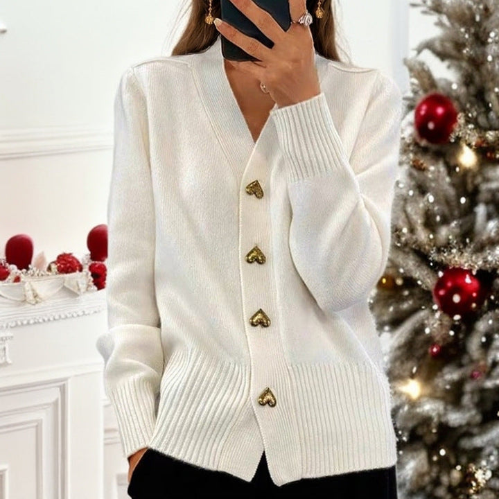 Moderne dame V-hals cardigan med charmerende hjerteknapper, et must-have i kvinde mode.