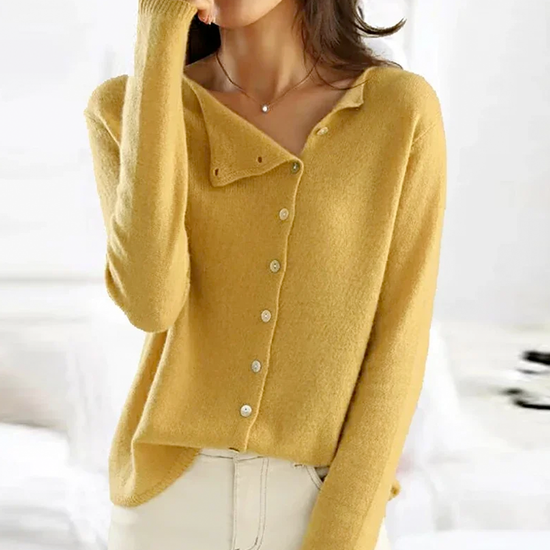 Stilfuld dame trøje med elegant sidelukning. En moderne cardigan der tilføjer mode og komfort til dit outfit.