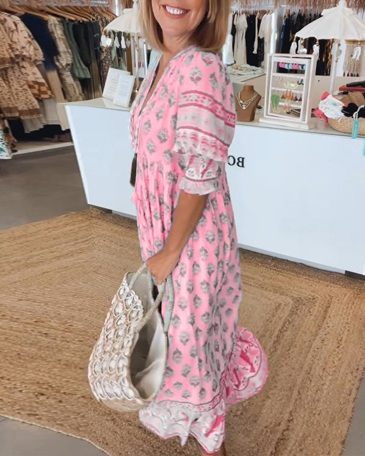 Feminint designet forårskjole til damer med V-udskæring, letvægt og et strålende, moderne look.
