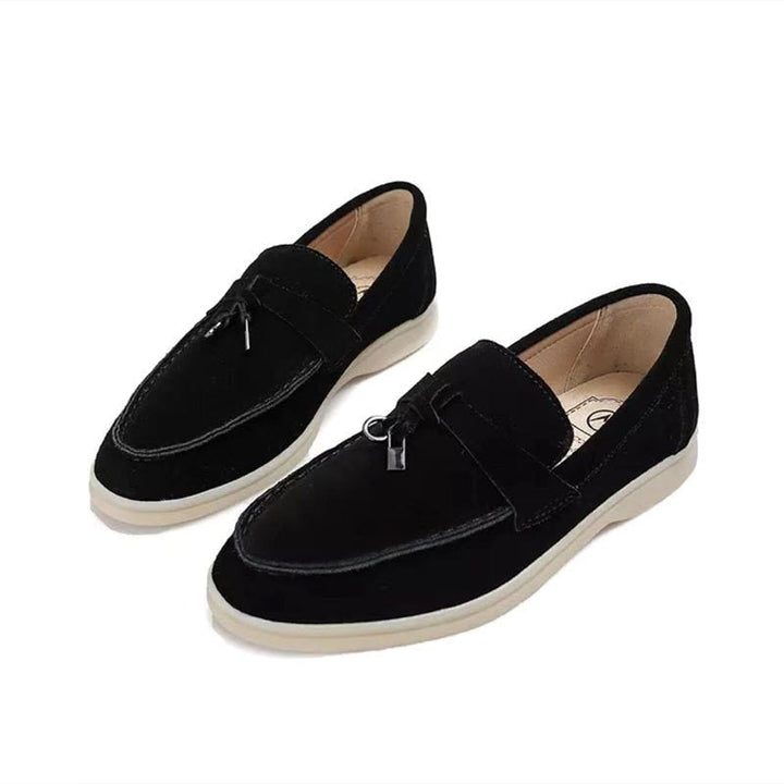 Sorte dame loafers med spids tå, stilfulde og alsidige kvindesko til enhver lejlighed.
