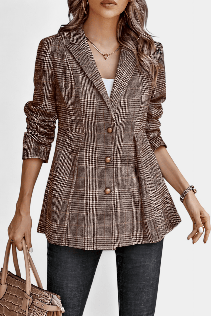 Elegant dame peplum blazer med klassisk rutemønster, ideel til kontor og stilfuld mode.