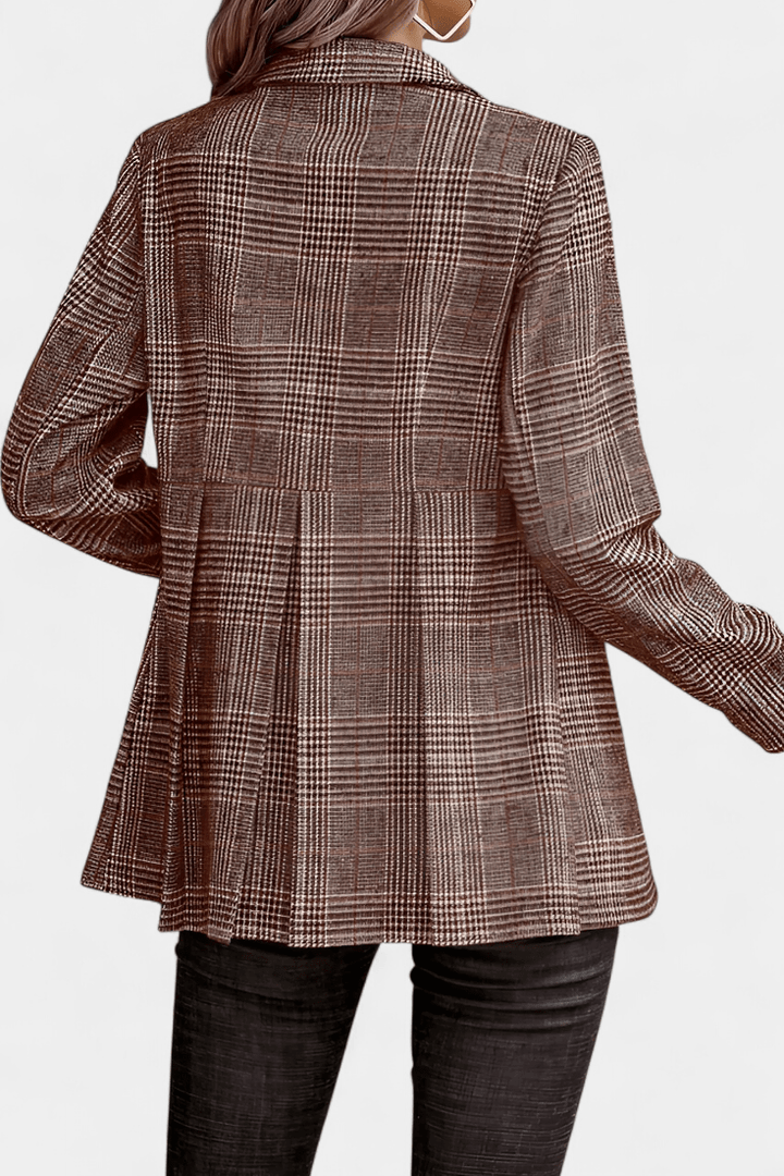 Stilfuld peplum blazer til kvinder med klassisk rutemønster, perfekt til kontor og mode.
