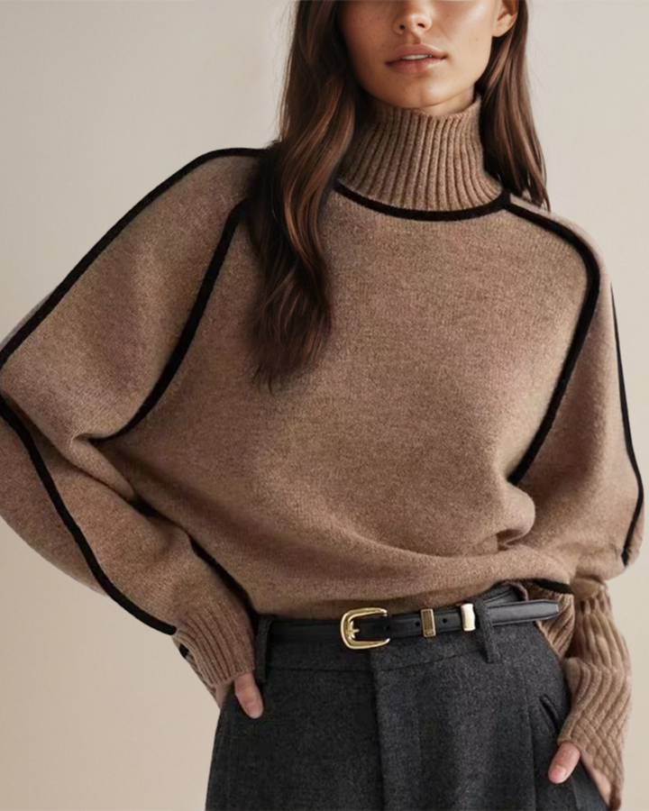 Brun dame rullekravetrøje. Elegant vintertrøje med moderne design og iøjnefaldende kontrast piping. Komfortabel pasform.