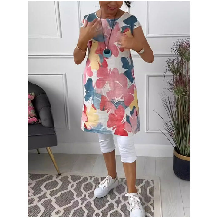 Trendy dame skjortekjole med elegant sommerfugleprint. En knælang kjole for et stilrent og feminint look.