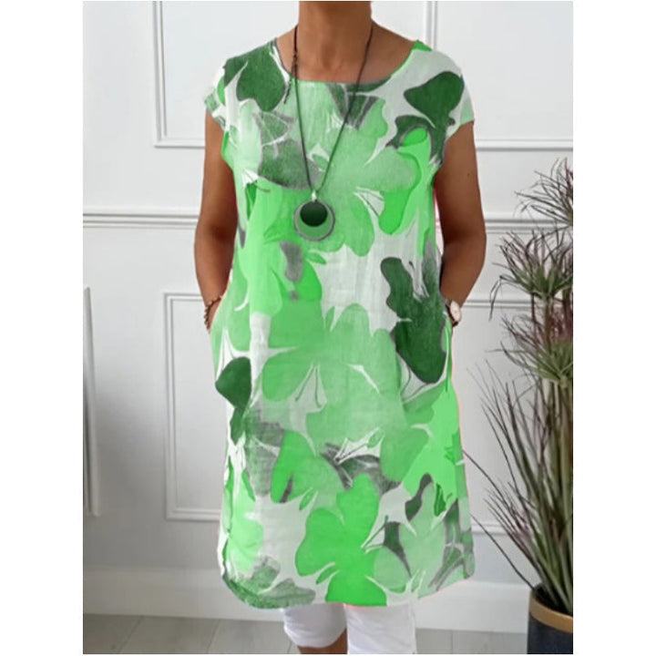 Alsidsig damekjole med sommerfugleprint. En elegant skjortekjole til kvinder, velegnet til både hverdag og fest.