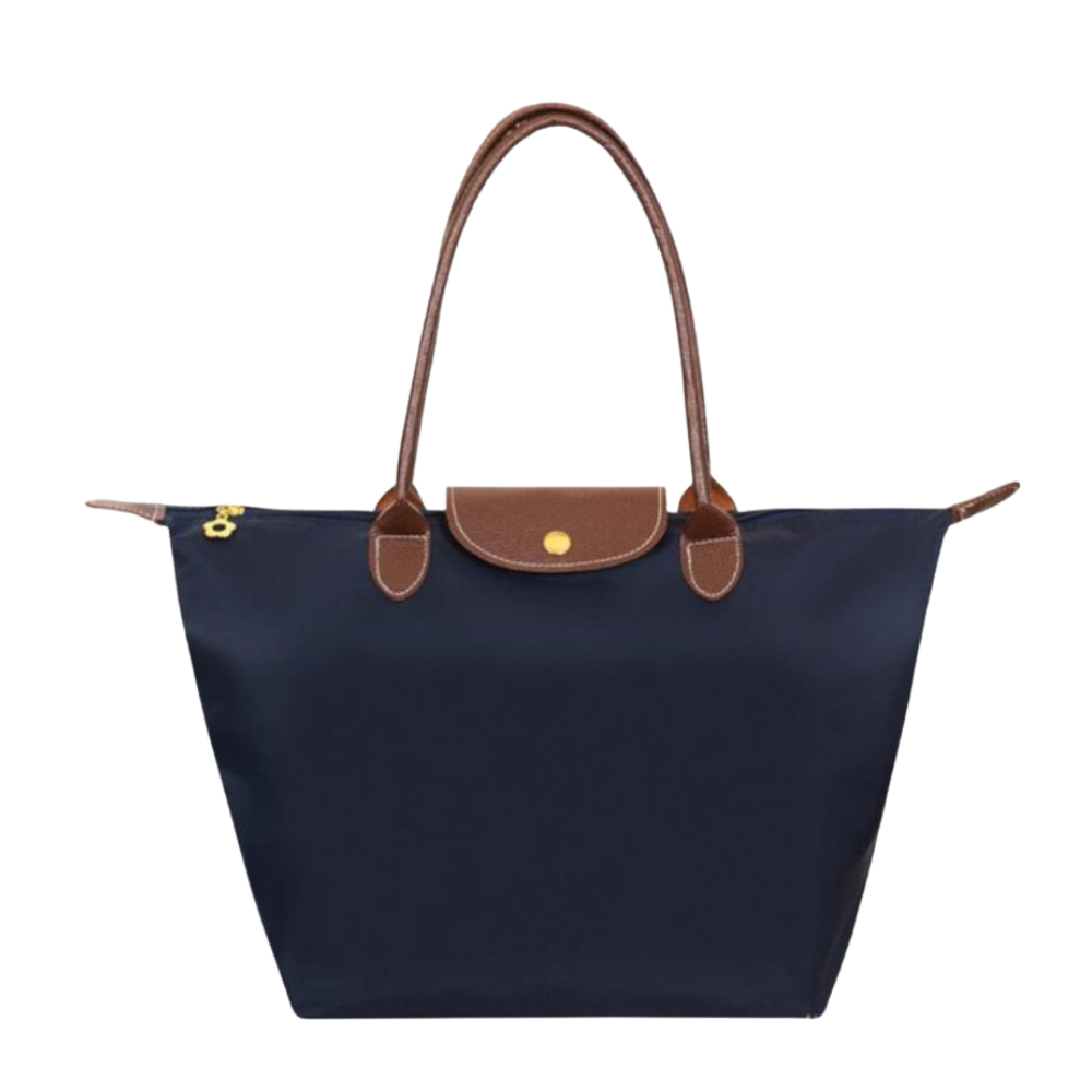 Alsidig dame taske: elegant skuldertaske eller crossbody med schedel design og justerbar rem.