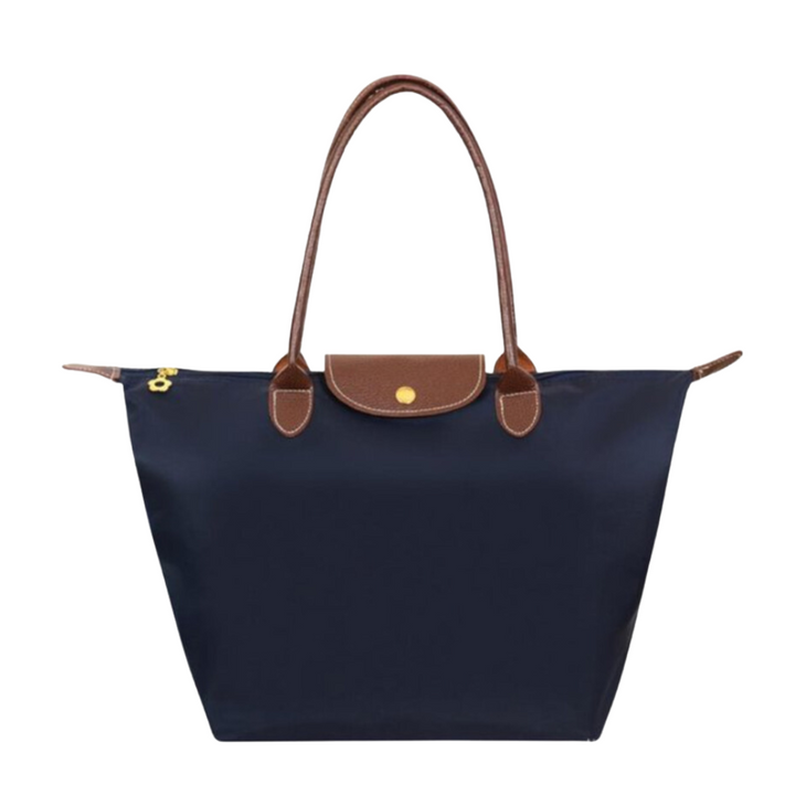 Forfra: Elegant dame håndtaske, schedel design, justerbar skulderrem. Stilfuld crossbody taske.