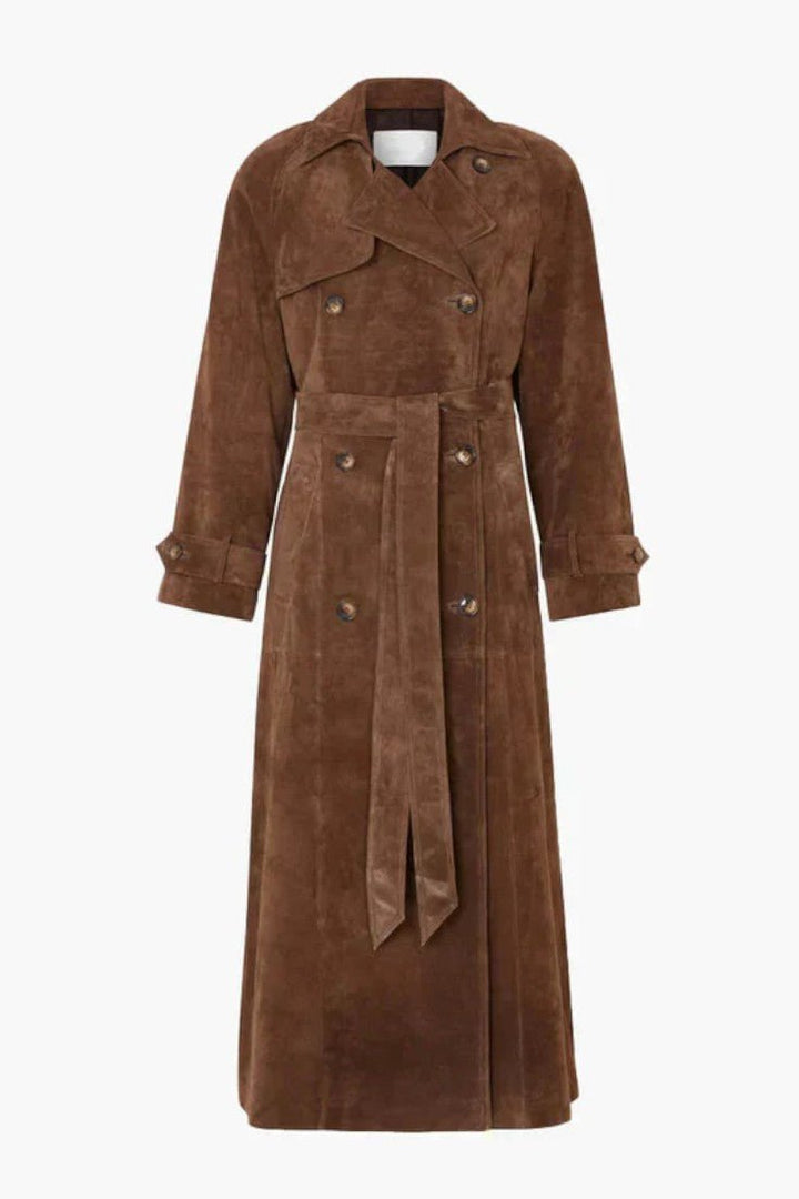 Elegant dame trenchcoat, der fuldender ethvert outfit. Alsidig modejakke til forår, efterår og kontor.