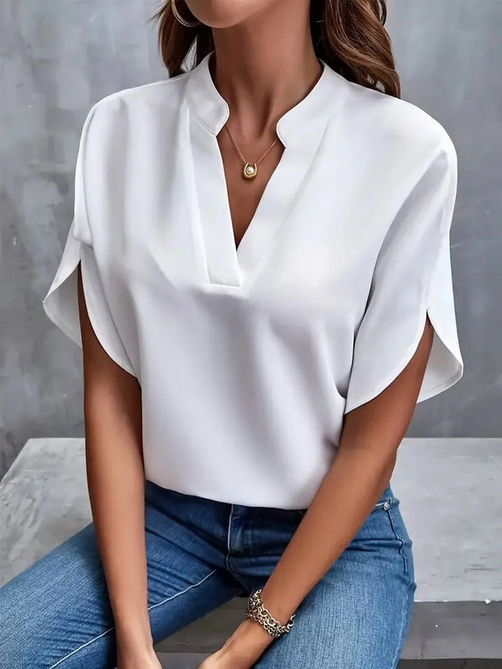 Elegant dame V-hals bluse. Perfekt til både hverdag og fest, udstråler stil og komfort.