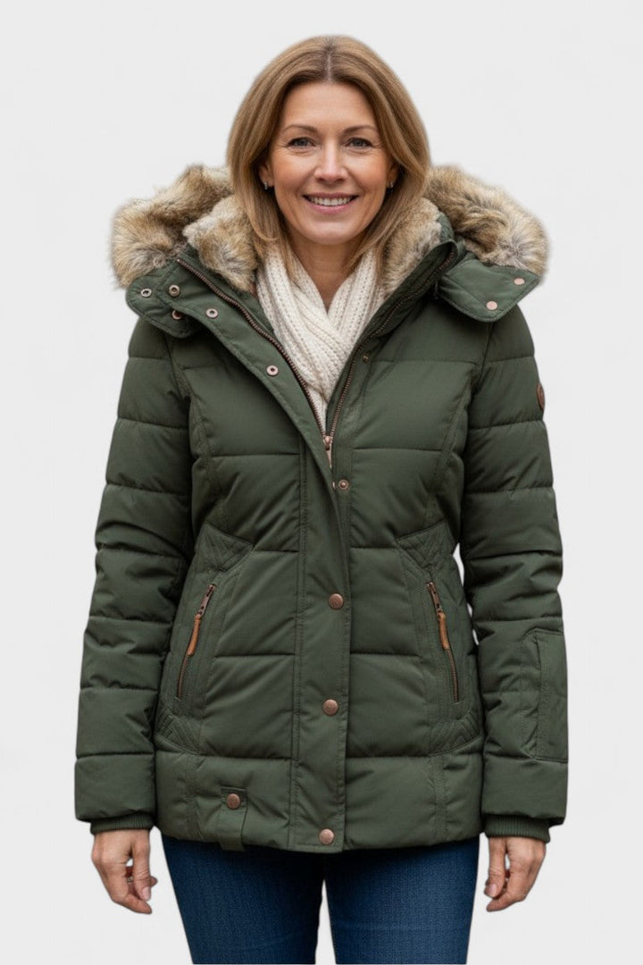 Komfortabel og varm damefrakke til vinter og efterår, med luksuriøst pelsfor indeni.