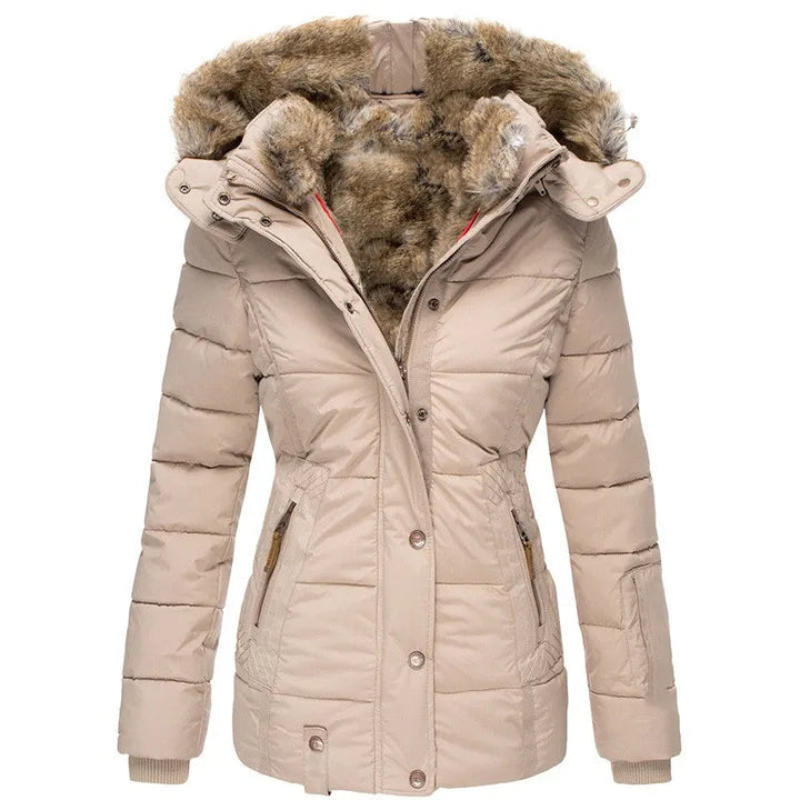 Varm dame vinterjakke med aftagelig pelskrave. Elegant og komfortabel kvindejakke til koldt vejr.