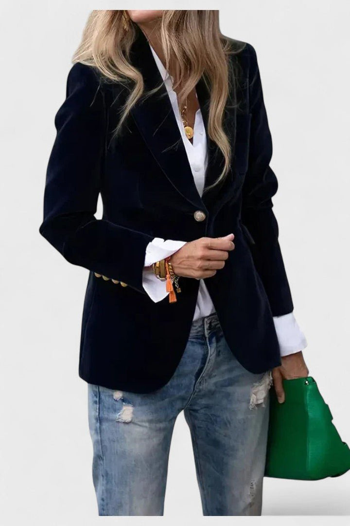 Klassisk sort dameblazer, ideel til elegant kontorstil, formelle begivenheder eller festtøj.