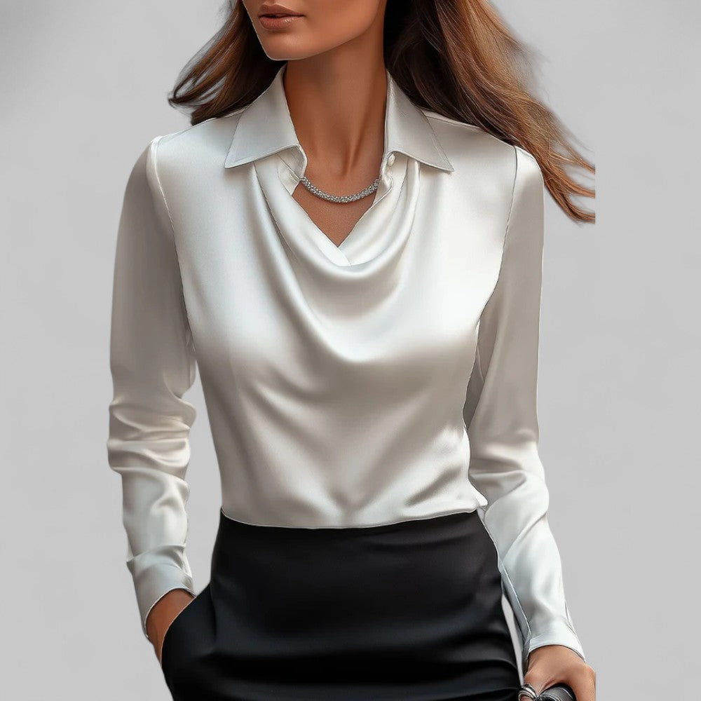 Elegant damebluse med draperet hals i ensfarvet design, perfekt til kontor eller fest.