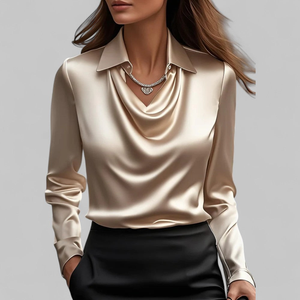 Elegant og stilfuld damebluse med draperet hals. Alsidig til hverdag, kontor og fest.