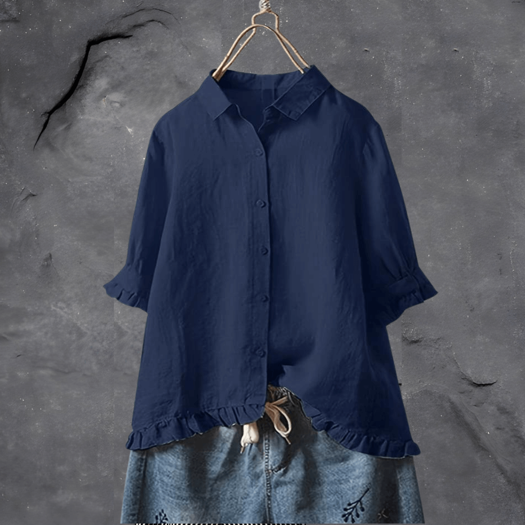 Elegant damebluse med løs pasform til hverdag. Komfortabel kortærmet sommerbluse med knapper.