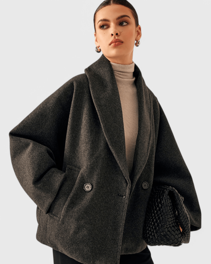 Kvalitets damefrakke i elegant tweed. Klassisk snit til en stilfuld vintergarderobe.