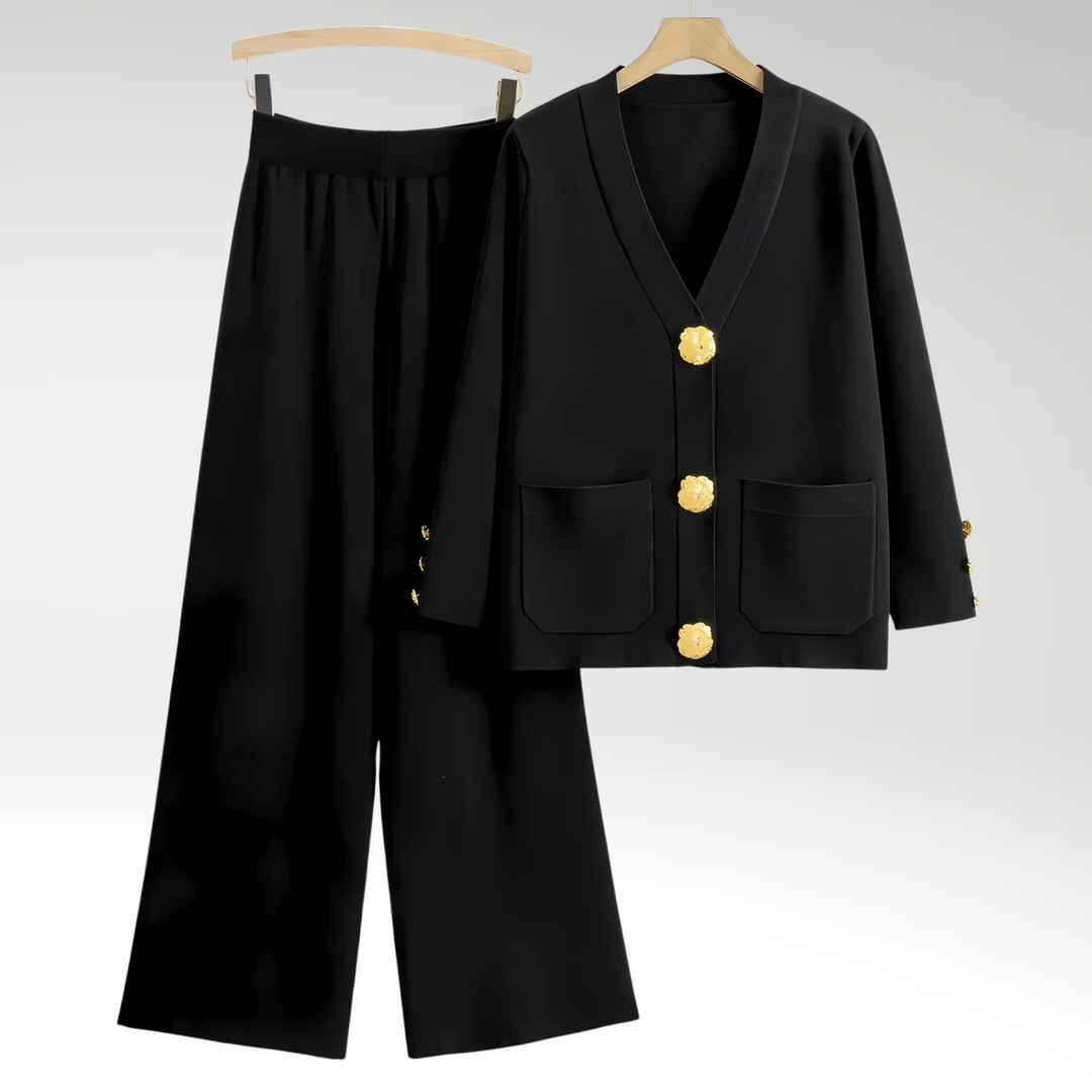 Stilfuldt blazer sæt til damer med brede bukser. Power suit med flatterende pasform, ideel til business look.