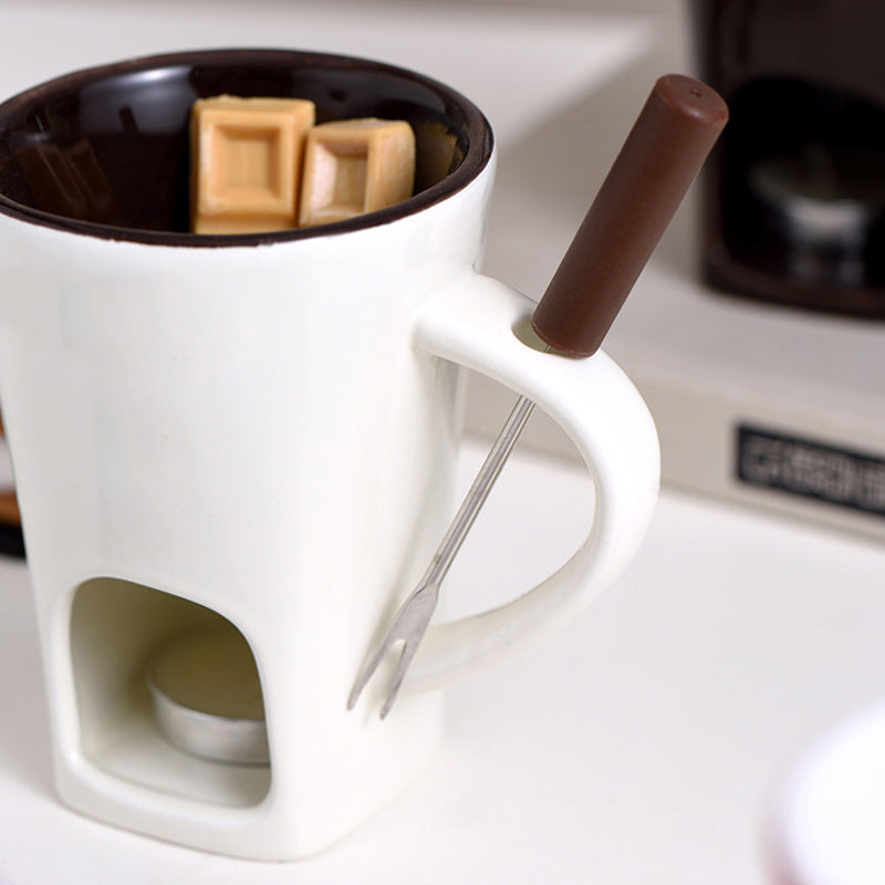 Funktionelt køkkenudstyr: Keramik fonduekop til chokolade, ost og en ægte hyggeoplevelse.