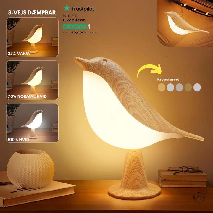 Elegant fuglelampe med justerbar LED-lysstyrke. Trådløs og genopladelig bordlampe skaber hygge.