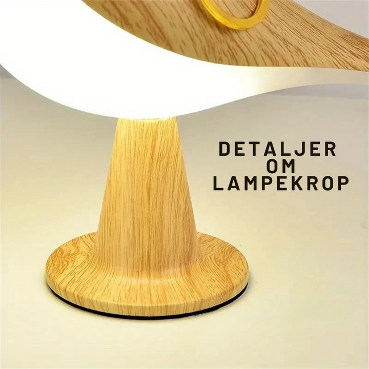 Bordlampe, fuglemodel, med dæmpbar LED. Genopladelig og trådløs for fleksibel og hyggelig belysning.