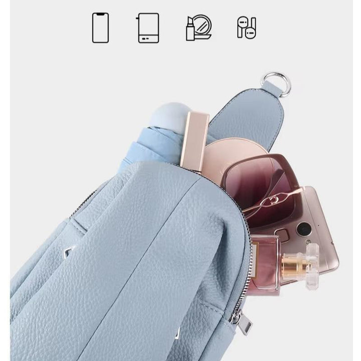 Moderne læder crossbody taske med unikt geometrisk design, elegant hverdagstaske.