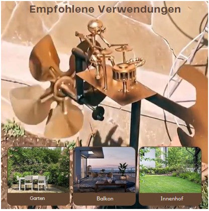 Elegant guitarformet vindmølle i metal til haven. Unik haveudsmykning med guld og sølv detaljer.