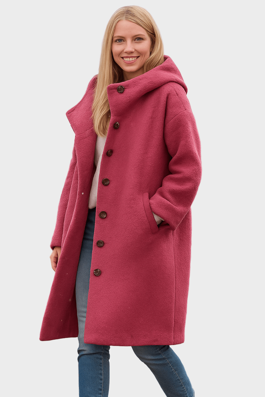 Elegant halvlang damejakke i sort, båret af model. Ideel som stilfuld overgangsjakke.