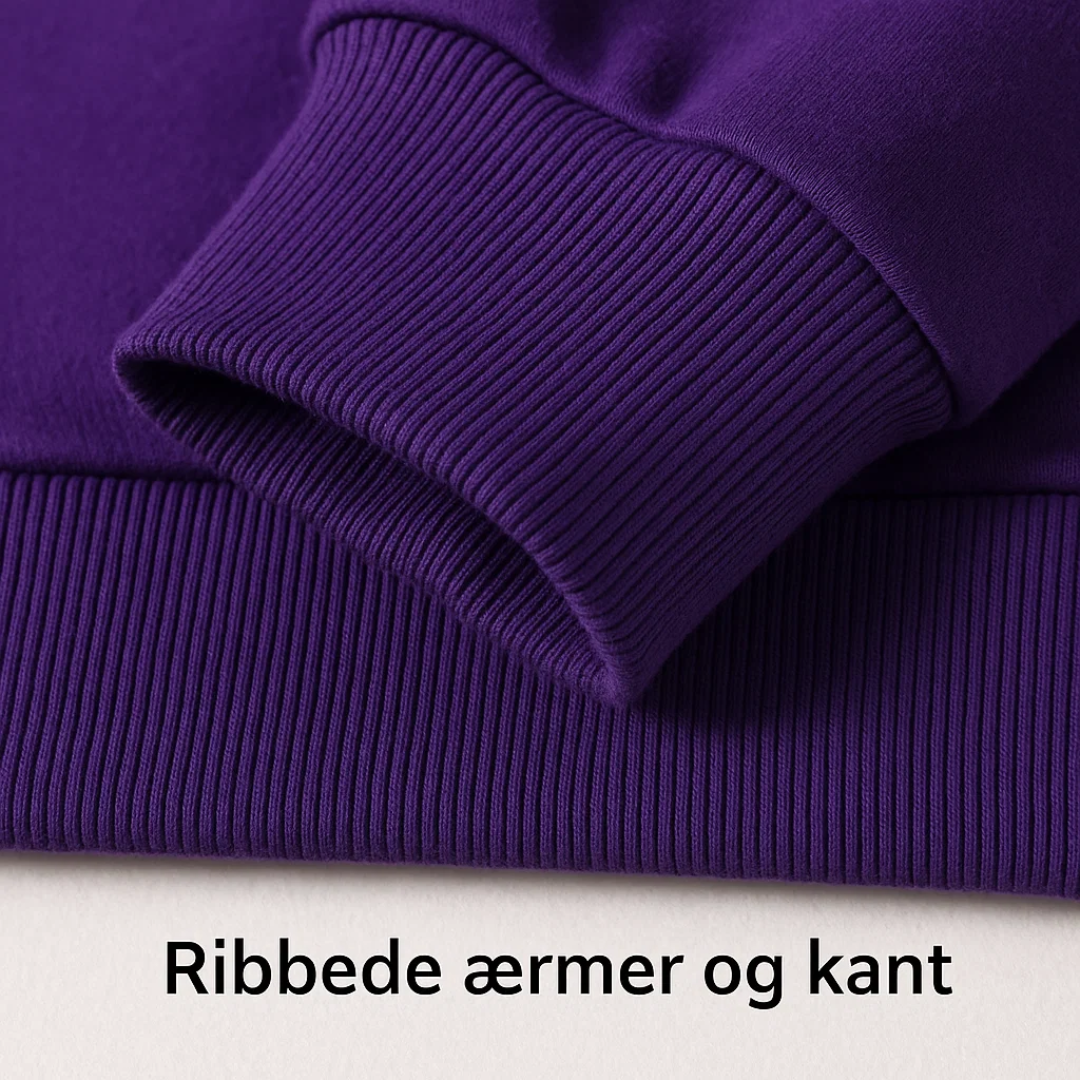 Elegant kvindesweater med diskret hjerte. En komfortabel og alsidig pullover til alle sæsoner.