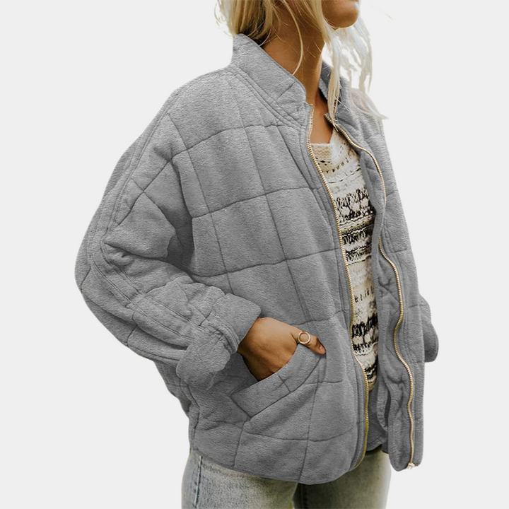 Alsidig damejakke til hverdagen, elegant og komfortabel. Et ideelt stykke overtøj til forår og efterår.