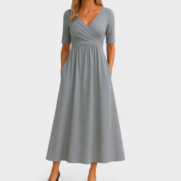 Elegant Joanna midi kjole til kvinder. Komfortabel sommerkjole, perfekt til fest og hverdag. Let og stilfuld.