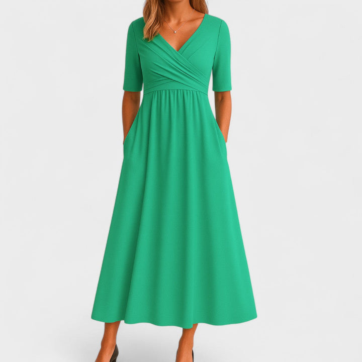 Joanna midi kjole: Elegant og komfortabel damekjole. Let sommerkjole i åndbart stof, perfekt til kvindemode.