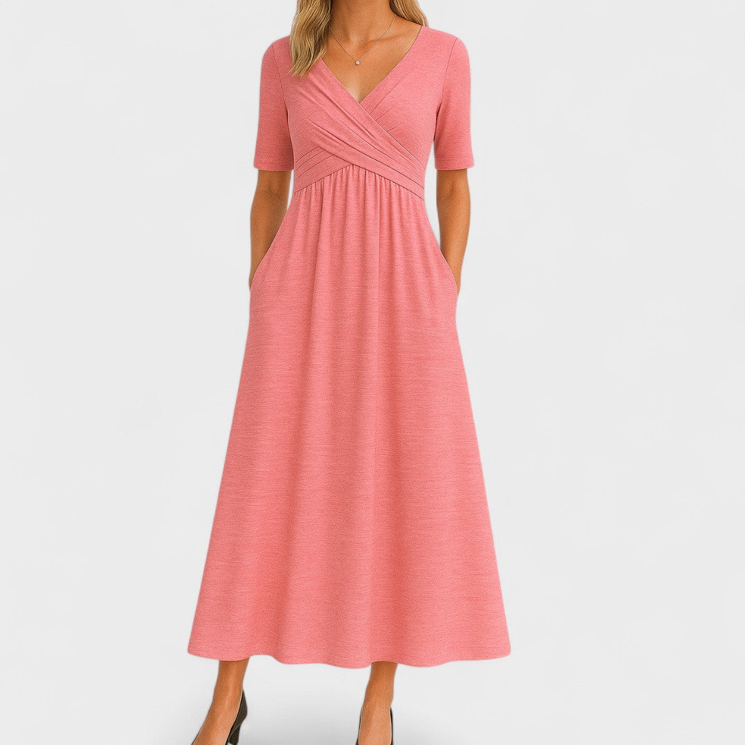 Elegant Joanna midi sommerkjole. Komfortabel kvindekjole i let stof, alsidig til enhver anledning i varmt vejr.