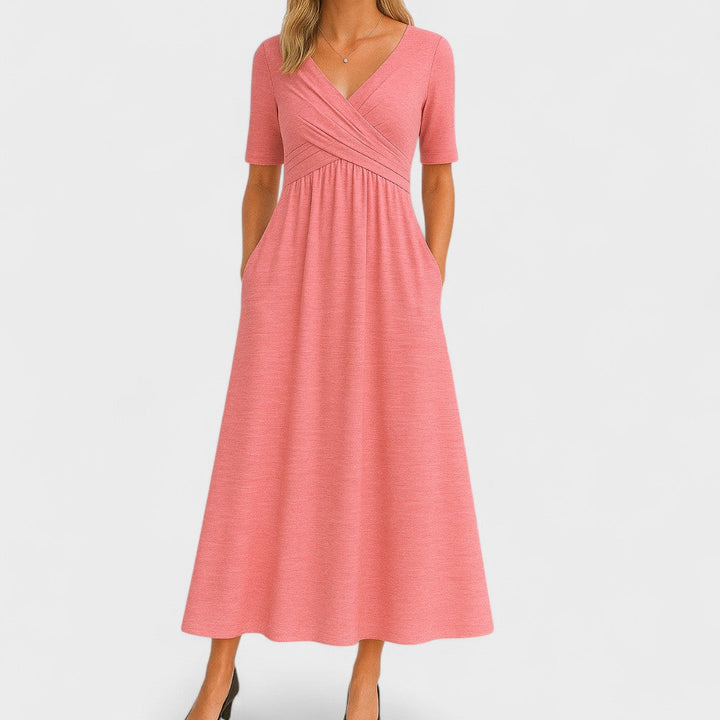 Elegant Joanna midi sommerkjole. Komfortabel kvindekjole i let stof, alsidig til enhver anledning i varmt vejr.