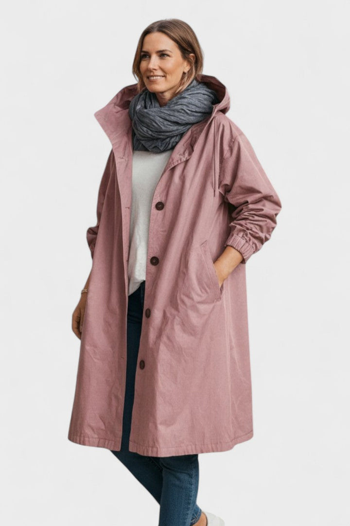 Elegant klassisk trenchcoat til kvinder, perfekt til forår og efterår. Stilfuldt vejrbestandigt overtøj.