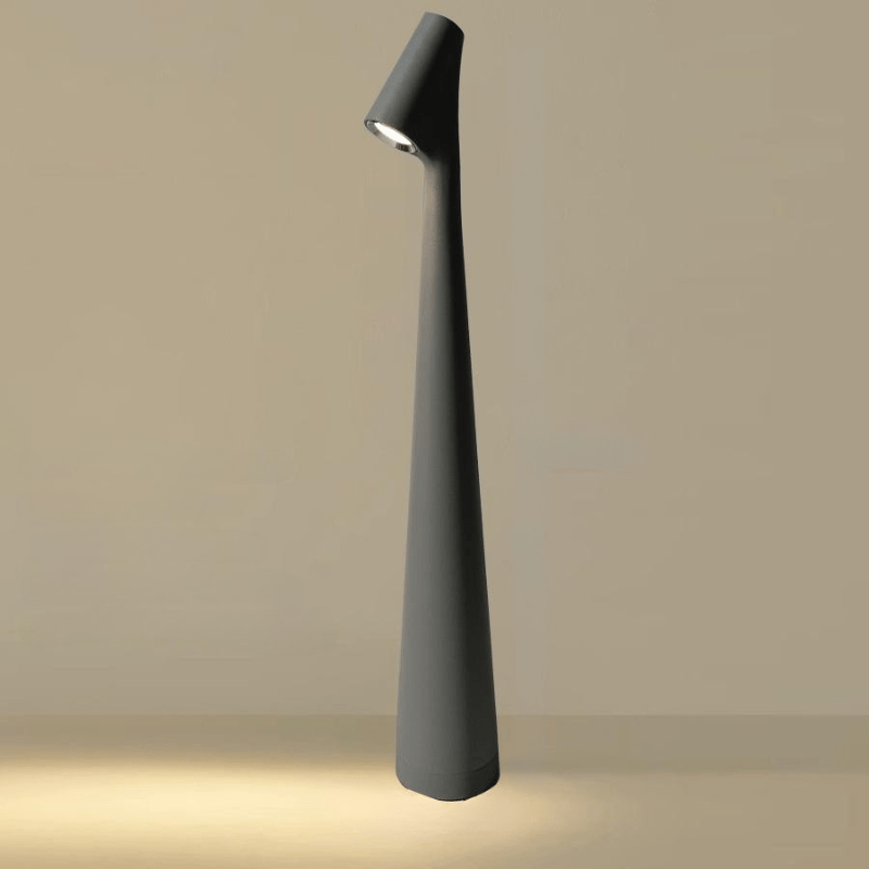 Elegant design møder funktionalitet: Kordeløs bordlampe med dæmpbart lys og lang levetid.