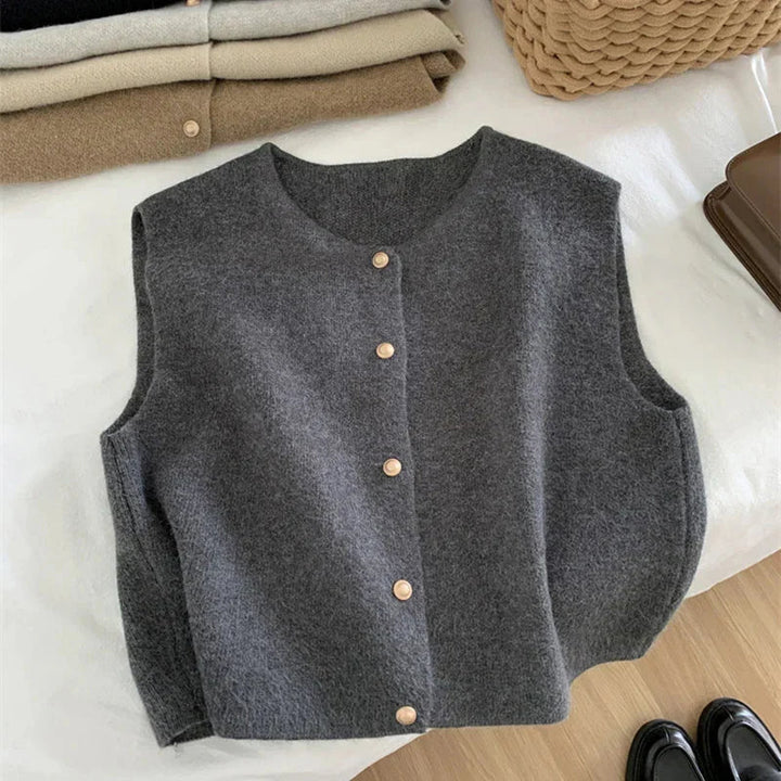 Trendy ærmeløs damevest, ideel til chic hverdagsstil. Alsidig kort vest med knapper for moderne look.