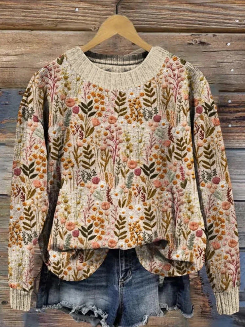 Elegant kvinde blomstret sweater, behagelig langærmet dametrøje til hverdag og stilfuld mode.