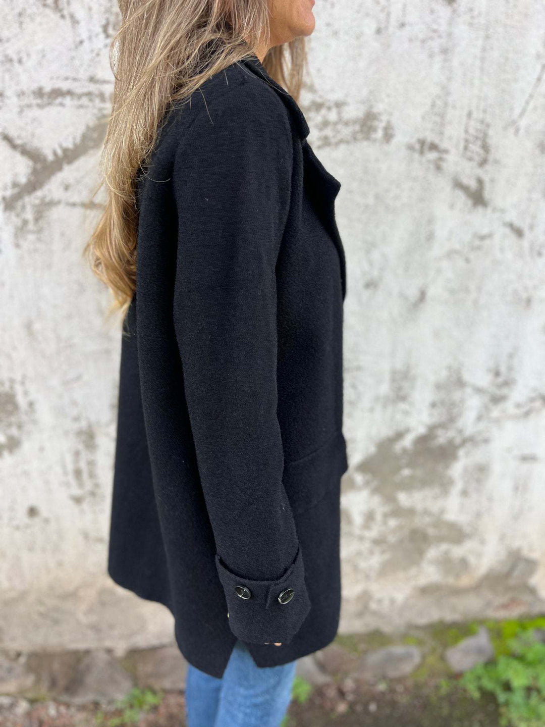 Alsidig dame reversjakke, ideel som varmt overtøj i efterår og vinter for den stilbevidste.