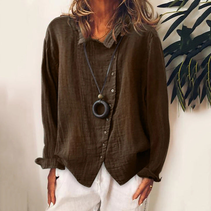 Stilfuld dame bluse med knapper til kontor og fest. Komfortabel skjorte med tidløst design til enhver anledning.