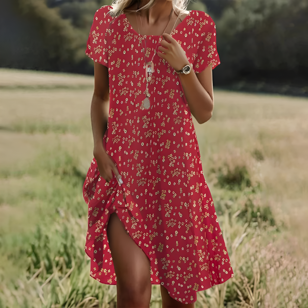 Dansk mode: elegant sommer midikjole til kvinder med taljebånd. Komfortabel og stilfuld til både fest og hverdag.