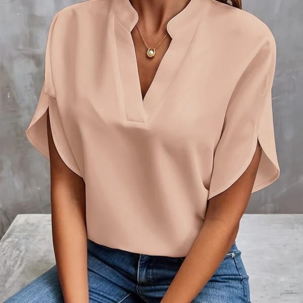 Kvinders alsidige top, perfekt som elegant bluse til alle lejligheder. Sommer og forår.