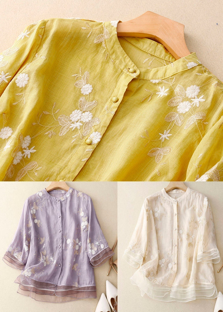 Bluse til kvinder med udsøgt blomsterbroderi, elegant design og komfortabel løs pasform.