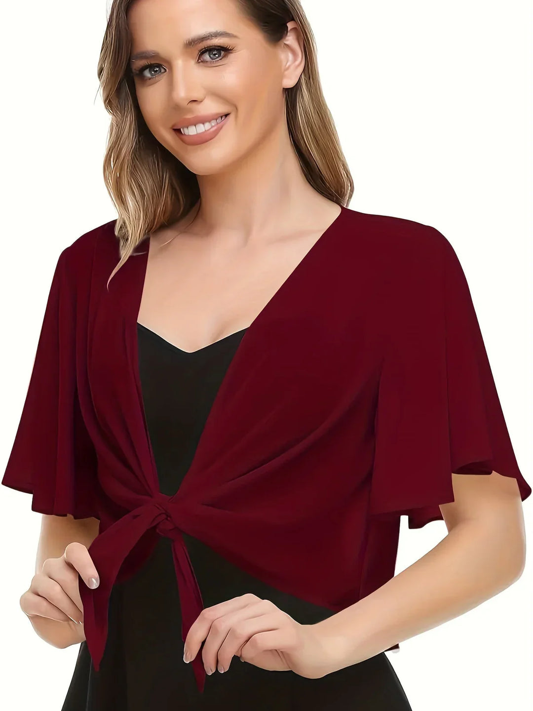 Dame bluse i elegant slå-om-design, langærmet og komfortabel. En farverig tilføjelse til din garderobe.