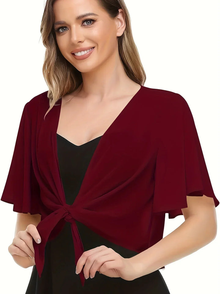 Dame bluse i elegant slå-om-design, langærmet og komfortabel. En farverig tilføjelse til din garderobe.