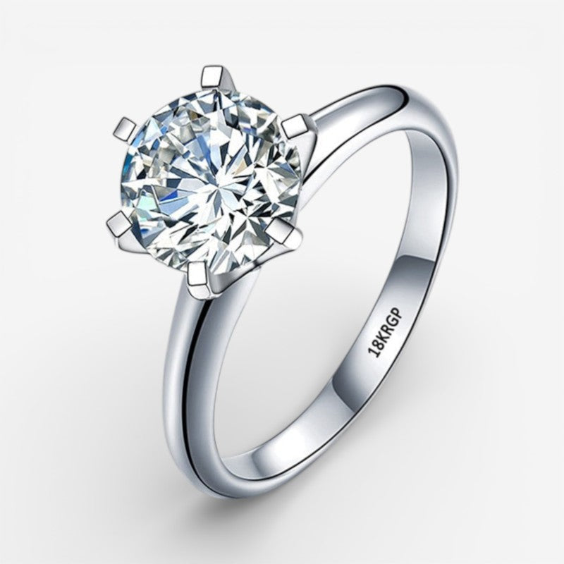 Elegant kvindering med glitrende diamantlignende sten, et smukt smykke til hverdagsbrug eller fest.