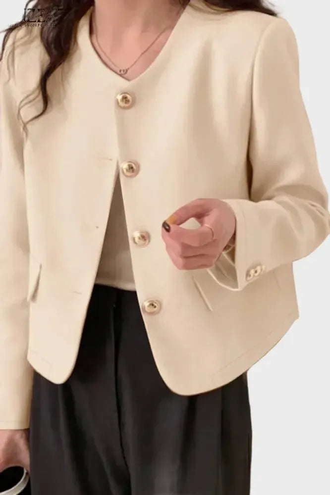 Elegant kvinders blazer med perfekt pasform, ideel til business og hverdag.