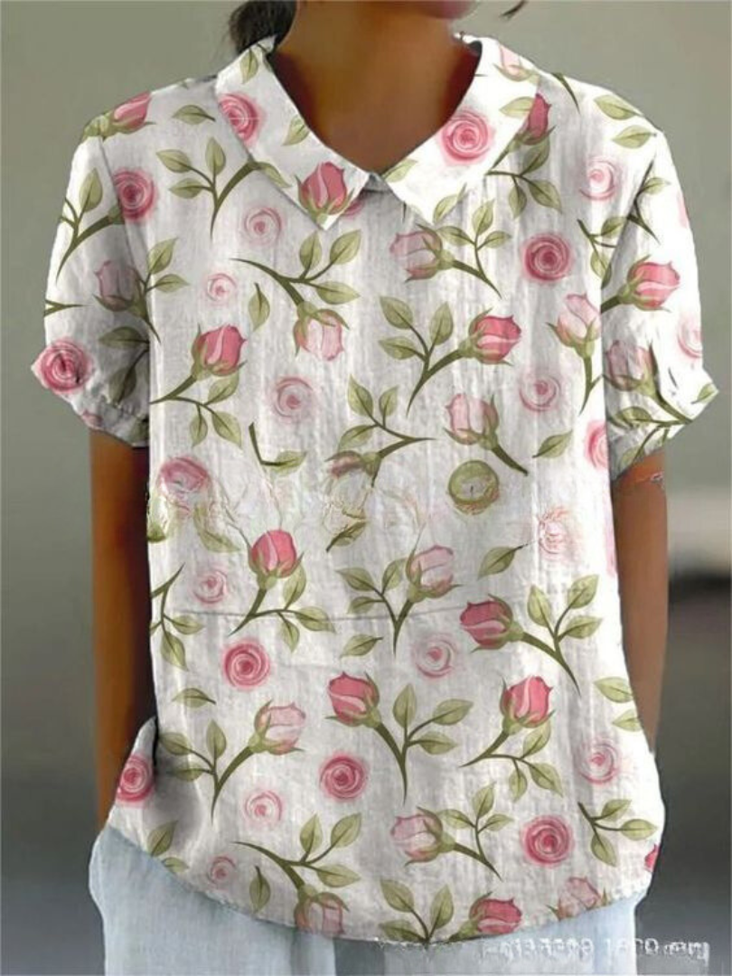 Feminin blomsterprint skjorte til kvinder, byder på en alsidig og komfortabel pasform til sommer mode.