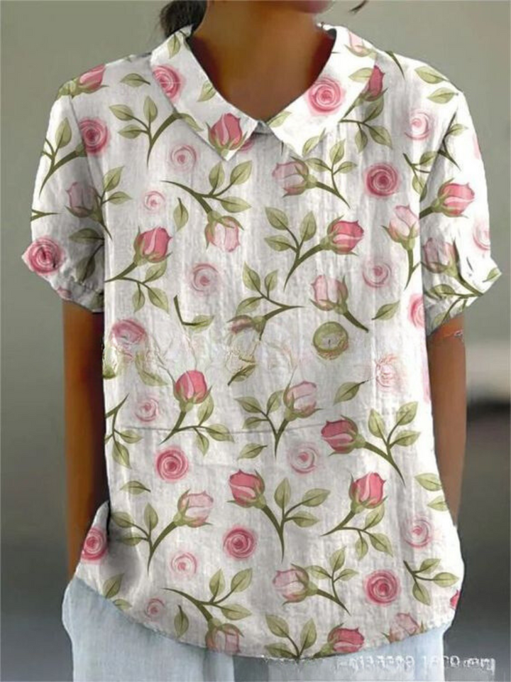 Feminin blomsterprint skjorte til kvinder, byder på en alsidig og komfortabel pasform til sommer mode.