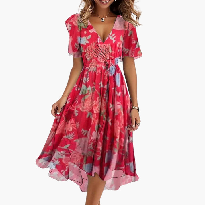 Forårs- og sommerkjole: Blomstret midi kjole til kvinder med V-hals og elegante flæseærmer.