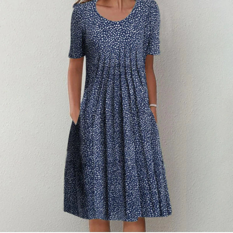 Blomstret casual sommerkjole med lommer for kvinder, et must-have til en let og luftig sommer.